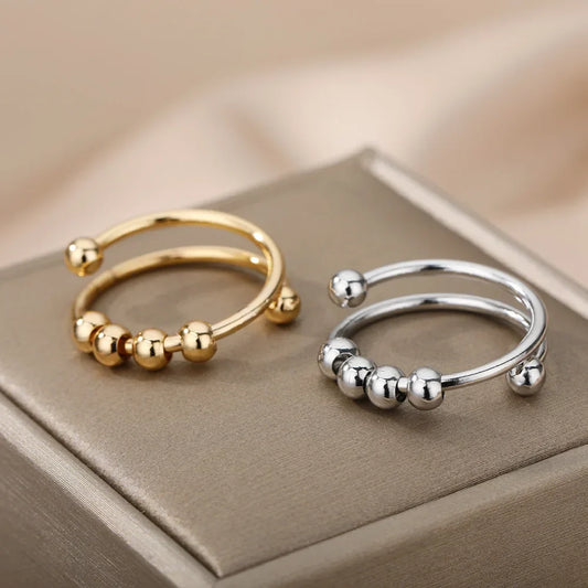 Maelis – Anillo Anti-Estrés con Perlas Giratorias