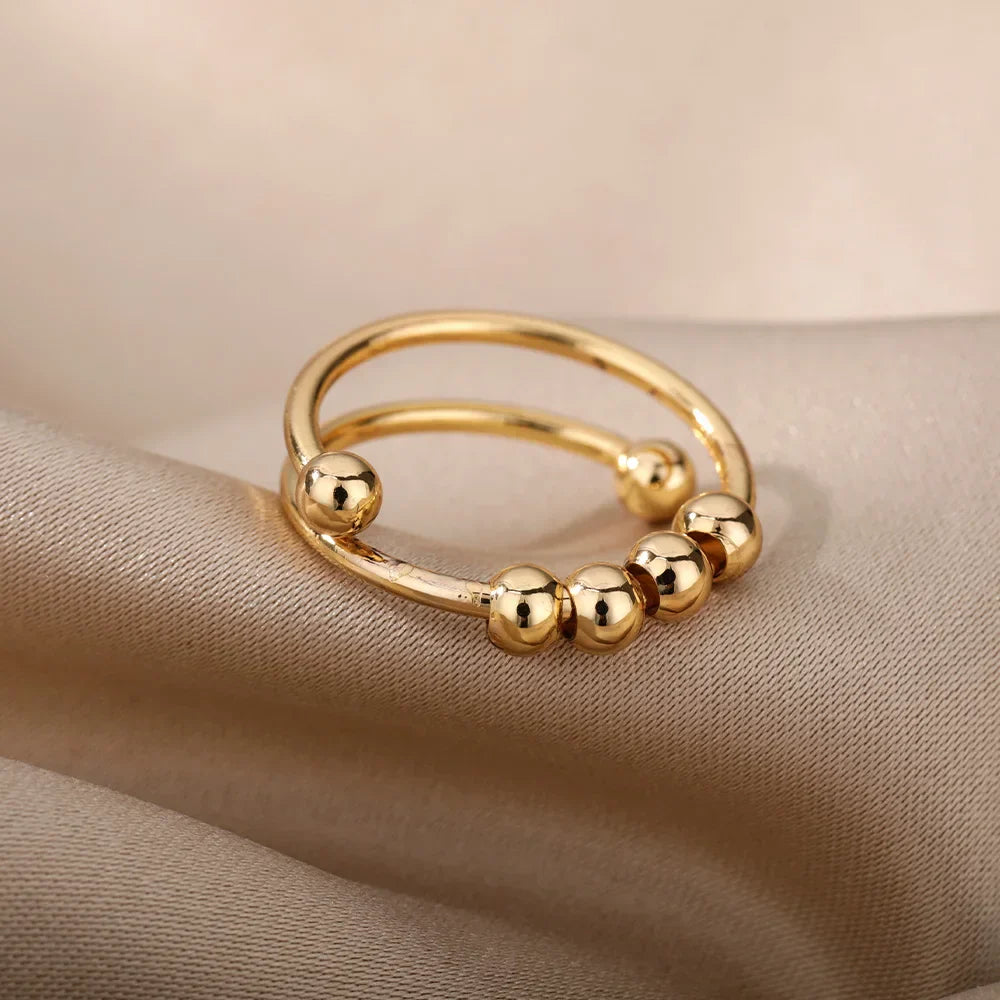 Maelis – Anillo Anti-Estrés con Perlas Giratorias