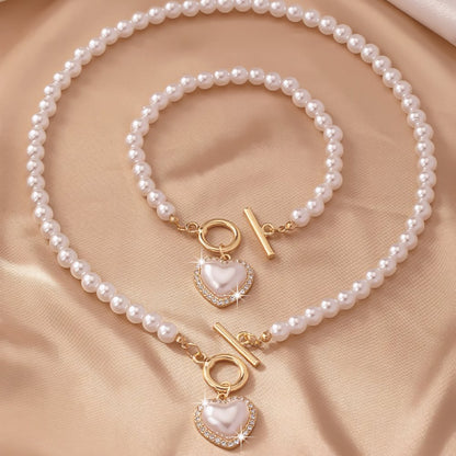 Lara – Conjunto Collar & Pulsera Corazón Perlado