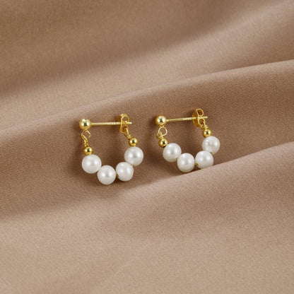 Yowe – Aretes de Perla de Brillo Dorado