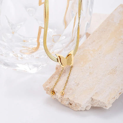 Nessa – Collar Mariposa Pendiente