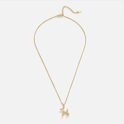 Nerina – Collar Colgante Perro Globo Dorado