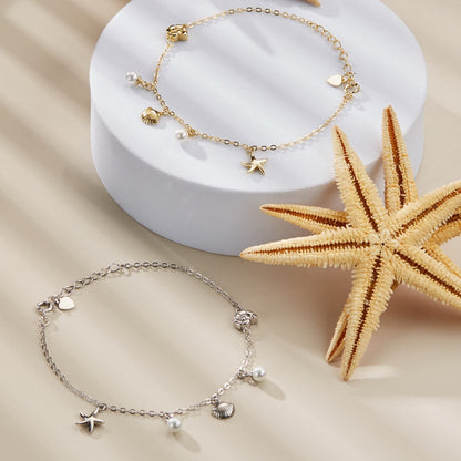 Pulsera con encanto de concha y estrella de mar