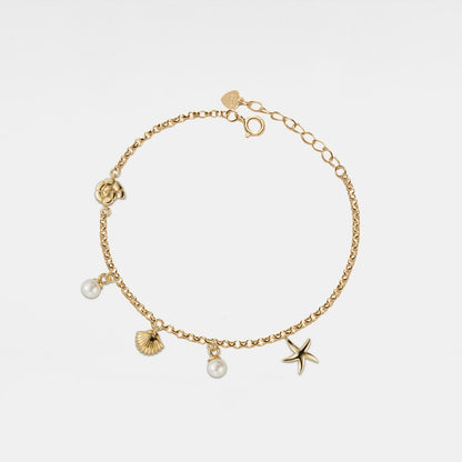 Pulsera con encanto de concha y estrella de mar