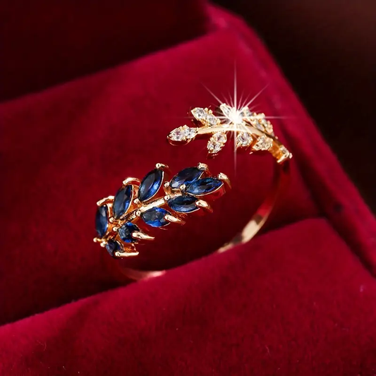 Azura – Anillo Abierto de Oro con Hoja y Circonita Azul