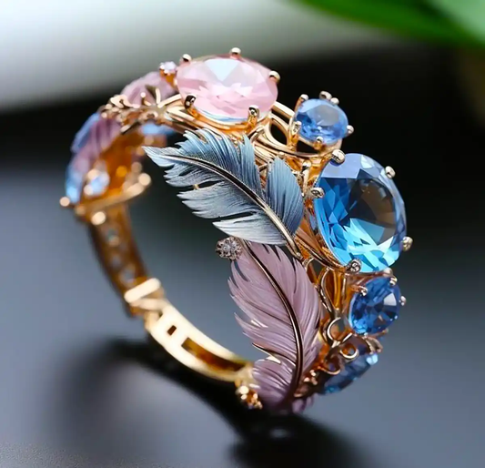Saphira – Anillo Vintage Pluma Exótica con Cristal