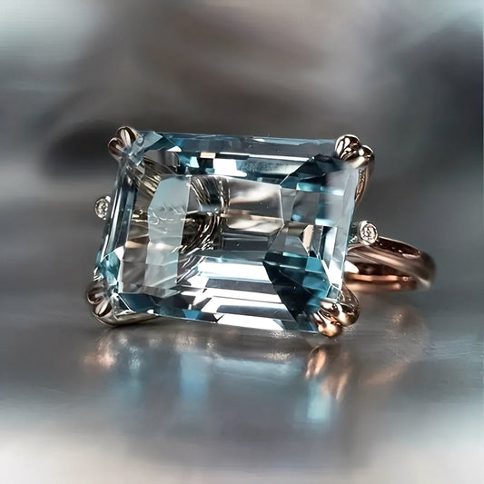 Nadine – Anillo Clásico Dorado con Circonita Azul