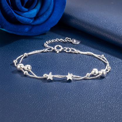 Alira – Pulsera Doble Estrella Elegante