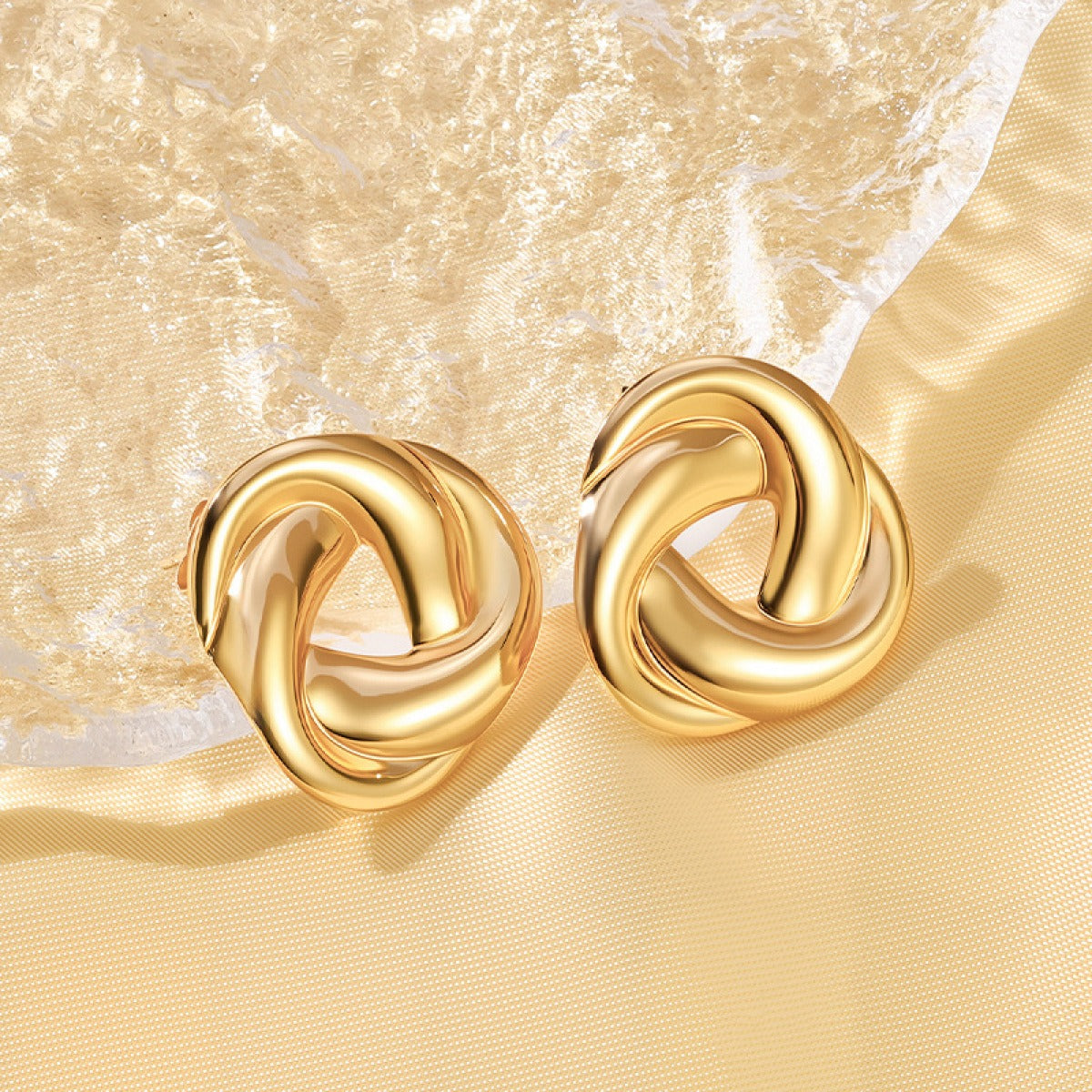 Thea – Pendientes Nudo Elegante