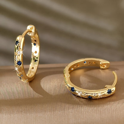 Maelis – Aros Dorados Vintage con Circonia Azul
