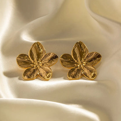 Rianne – Pendientes Flor Dorada Desplegada