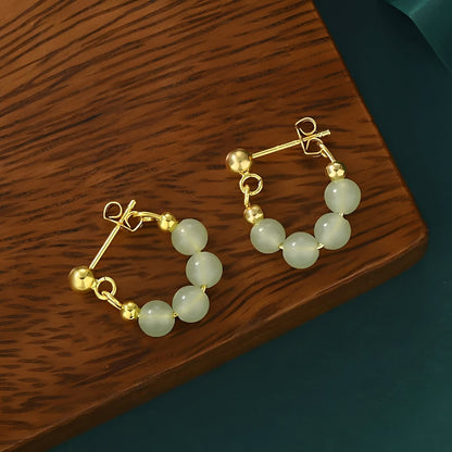 Pendientes de mujer con diseño de perlas redondas