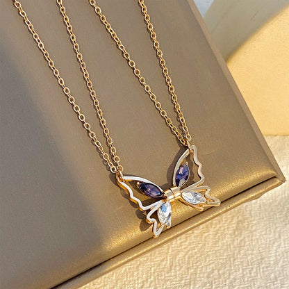 Abril – Collar Mariposa Magnético en Oro