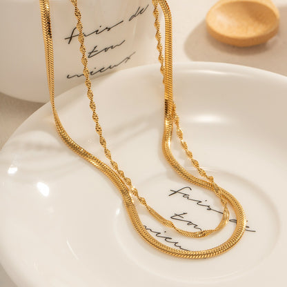 Elira – Collar de Doble Cadena Trenzada Dorada