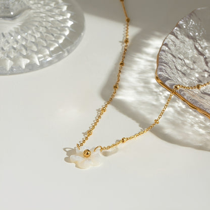 Carissa – Collar Dorado Flor con Piedra