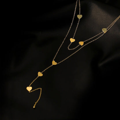 Christy – Collar Multi-Filas Corazones Dorados