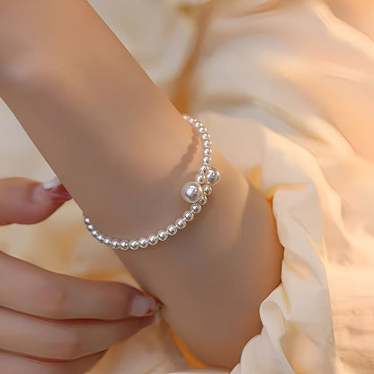Emma – Brazalete Refinado en Perlas Abiertas