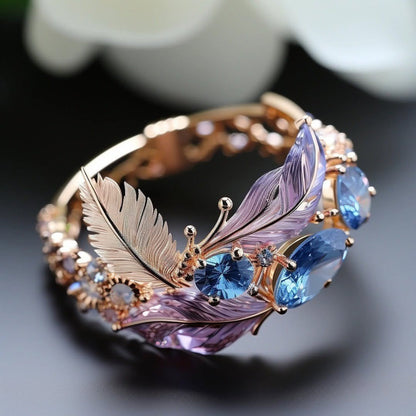 Saphira – Anillo Vintage Pluma Exótica con Cristal