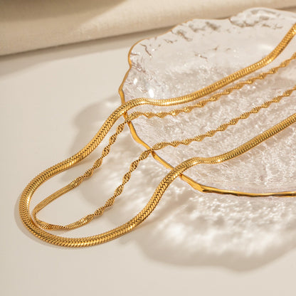 Elira – Collar de Doble Cadena Trenzada Dorada