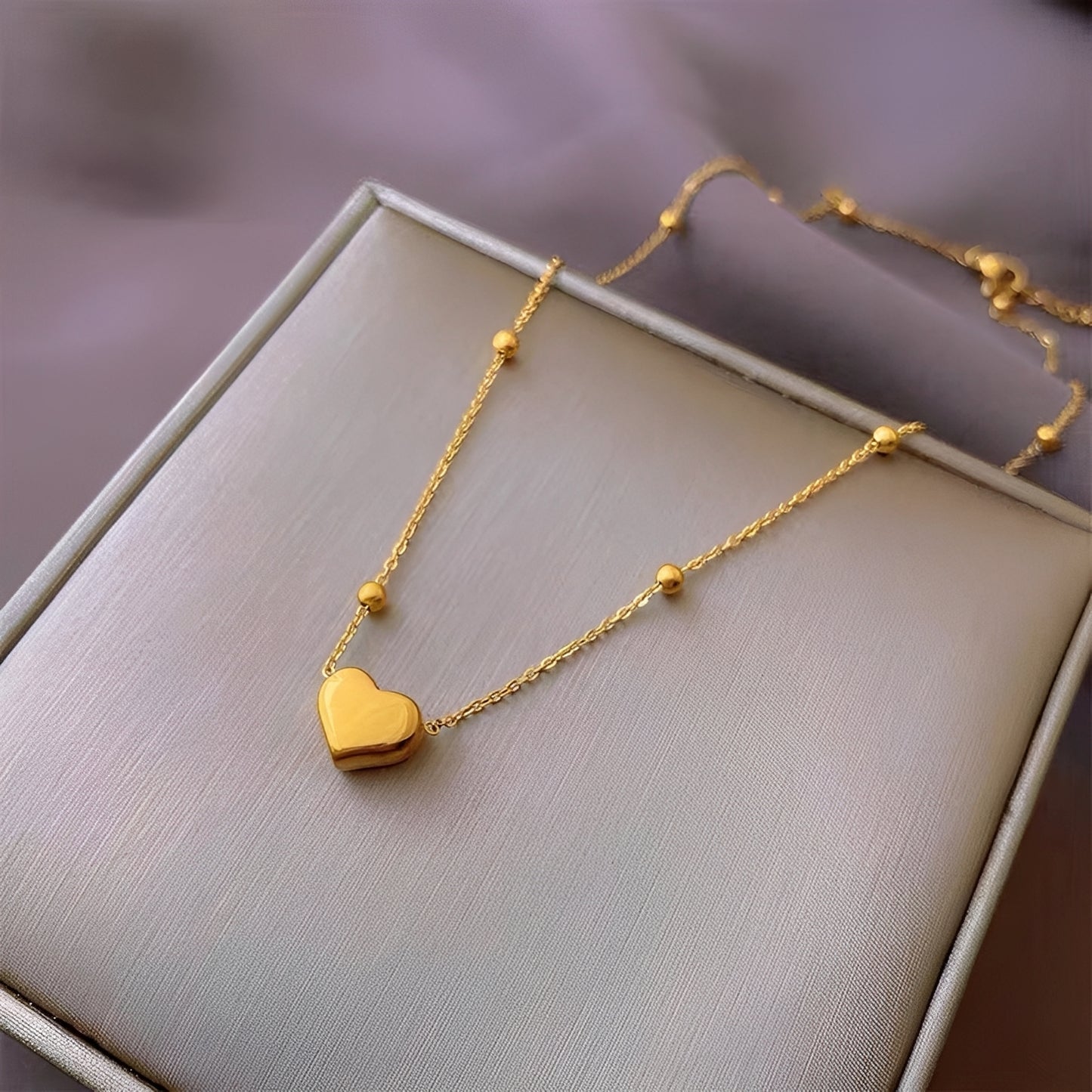 Amara – Collar Love en Acero Titanio