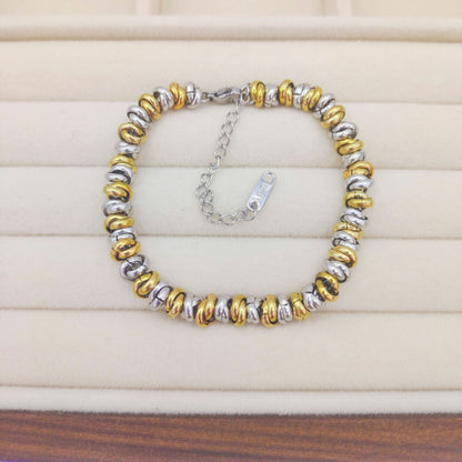 Anika – Pulsera Bicolor Trenzada con Cuentas