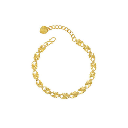 Edith – Pulsera Dorada con Motivo de Margarita