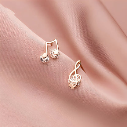 Reina – Bisutería de Orejas Musical en Oro con Zirconia