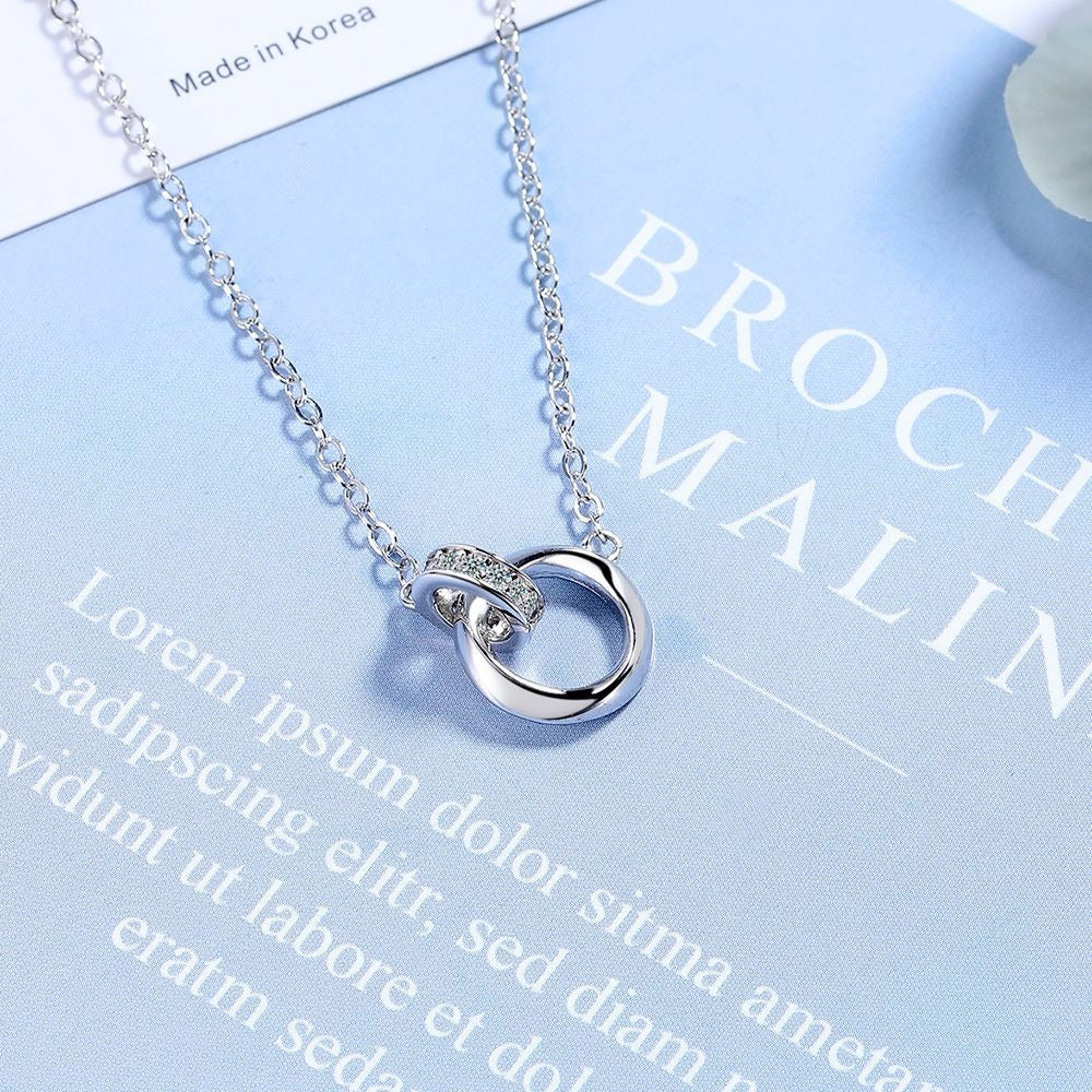 Kris – Collar Amor Cinta de Möbius en Plata de Ley