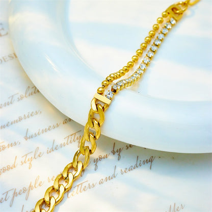 Roxana – Pulsera Doble Cadena Asimétrica Elegante