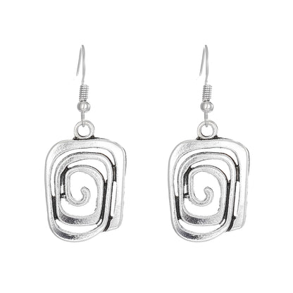 Kaia – Pendientes Boho en Plata con Diseño Espiral
