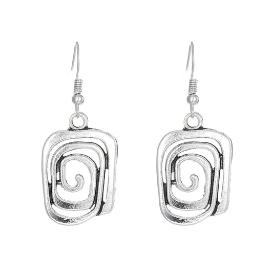 Kaia – Pendientes Boho en Plata con Diseño Espiral