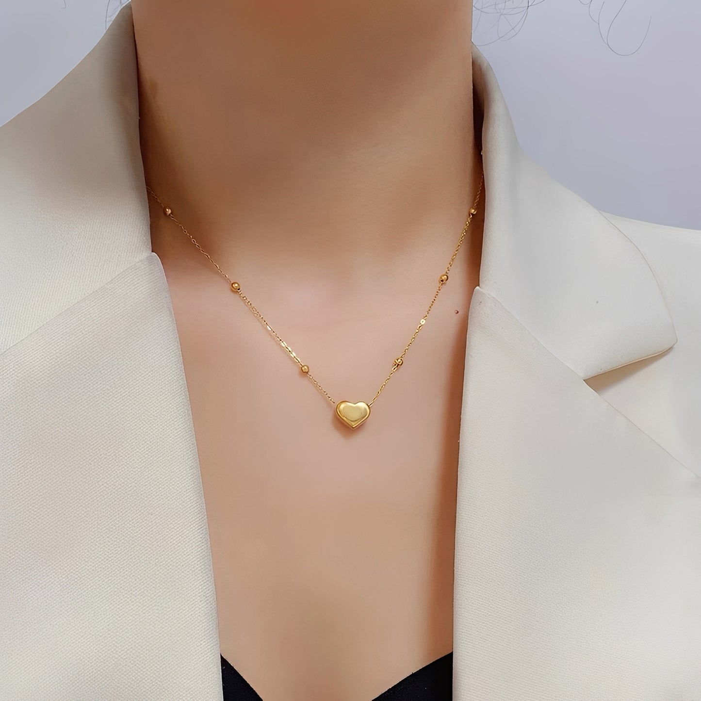 Amara – Collar Love en Acero Titanio