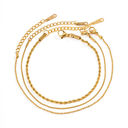 Bailey – Trío de Pulseras Finas Doradas Apilables para Mujer