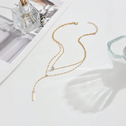 Tyra – Collar Y Multicapa con Borla Brillante