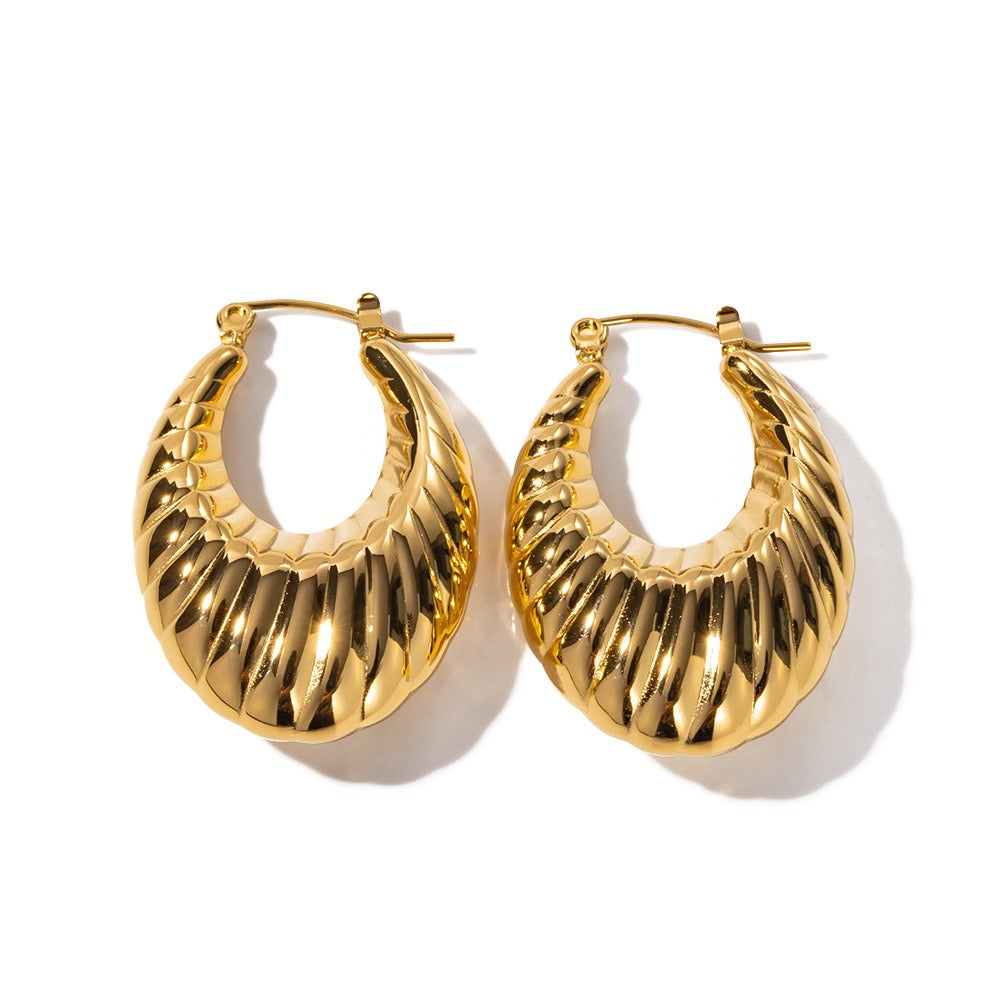 Alira – Pendientes Dorados Esculturales