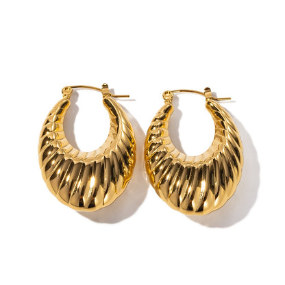 Alira – Pendientes Dorados Esculturales