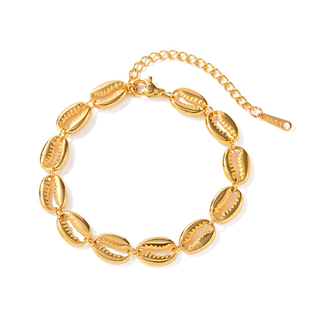 Remy – Pulsera Concha Dorada Elegante