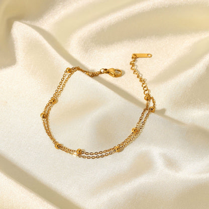 Erica – Pulsera Dorada Doble Cadena con Cuentas