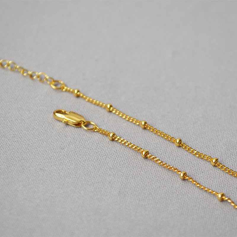 Marielle – Collar Dorado Texturizado en Capas Elegante