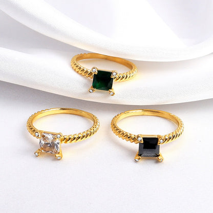 Reina – Anillo Twist con Zirconia Cuadrada