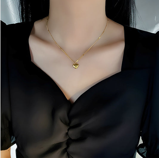 Yumi – Collar Corazón de Oro