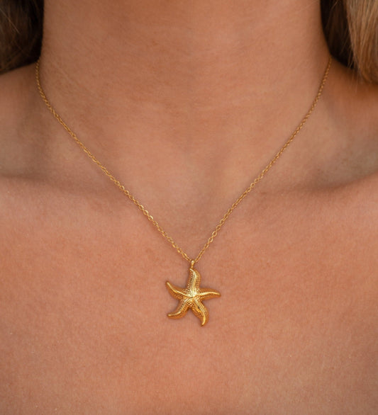 Collar de estrella de mar dorado