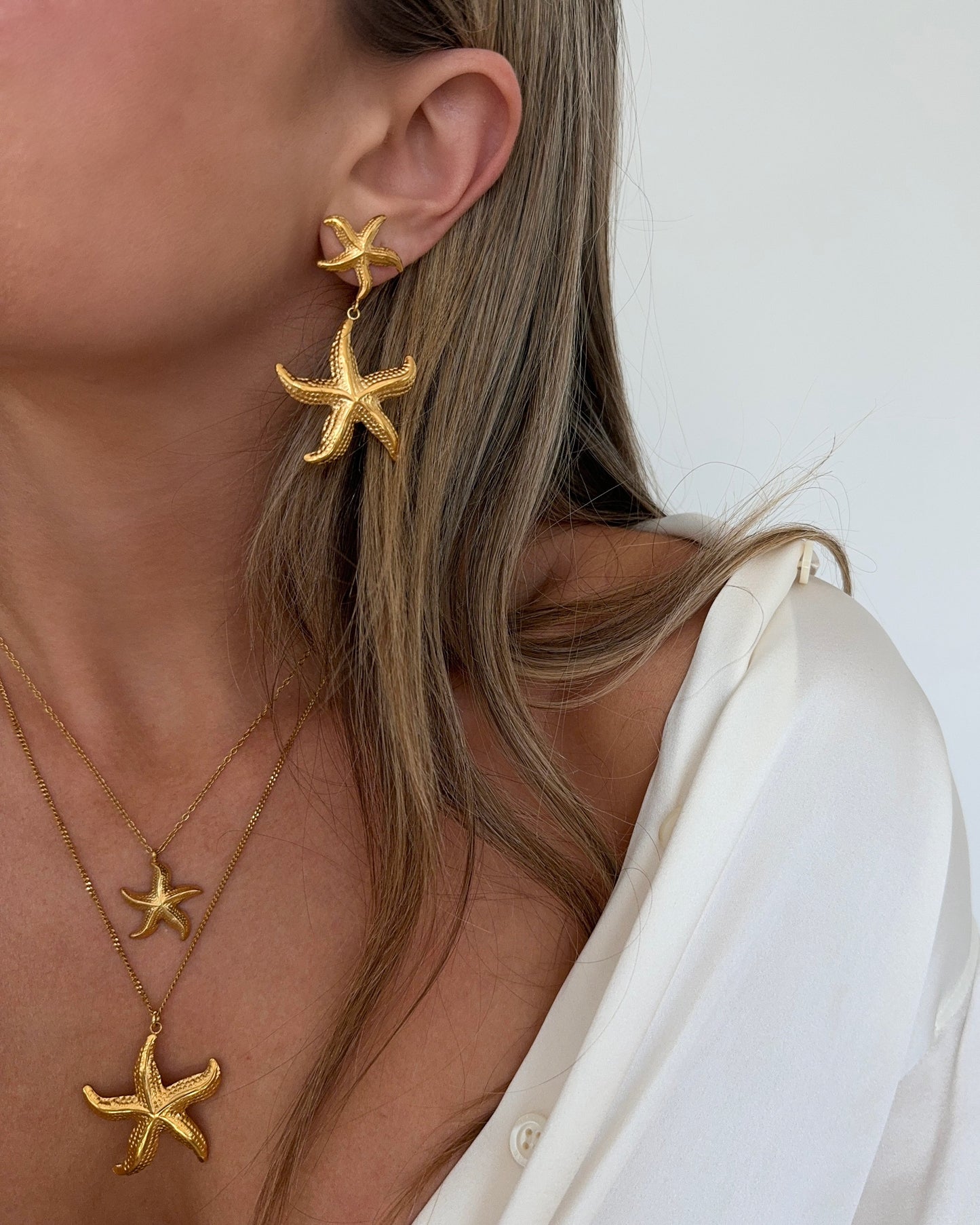 Collar de estrella de mar dorado