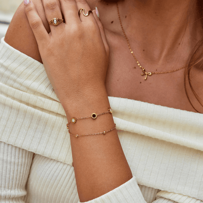 Nyra – Pulsera Onyx y Piedra Blanca