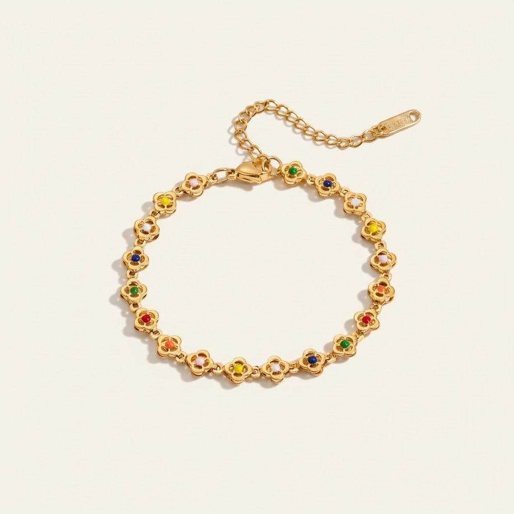 Pulsera Charm Dama con Varios Motivos Redondos y Acentos de Piedra Distribuidos