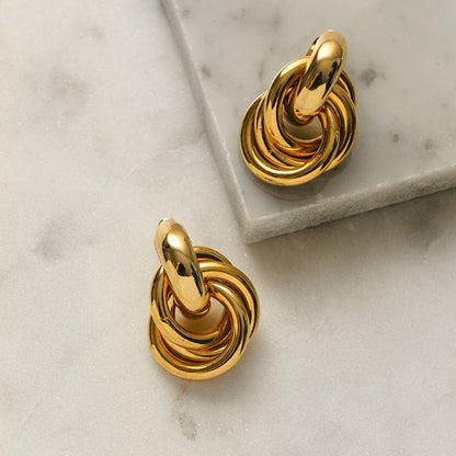 Rania – Boucles Doradas Diseño Entrelazado