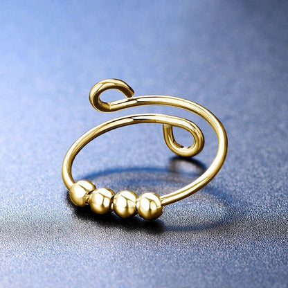 Dama Anillo Fidget Ajustable con cuatro perlas movibles